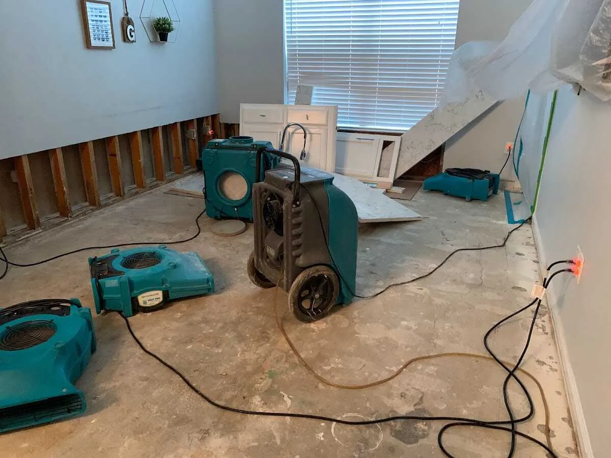 Dehumidifier in flood-cut room for Water Damage Restoration in Villas